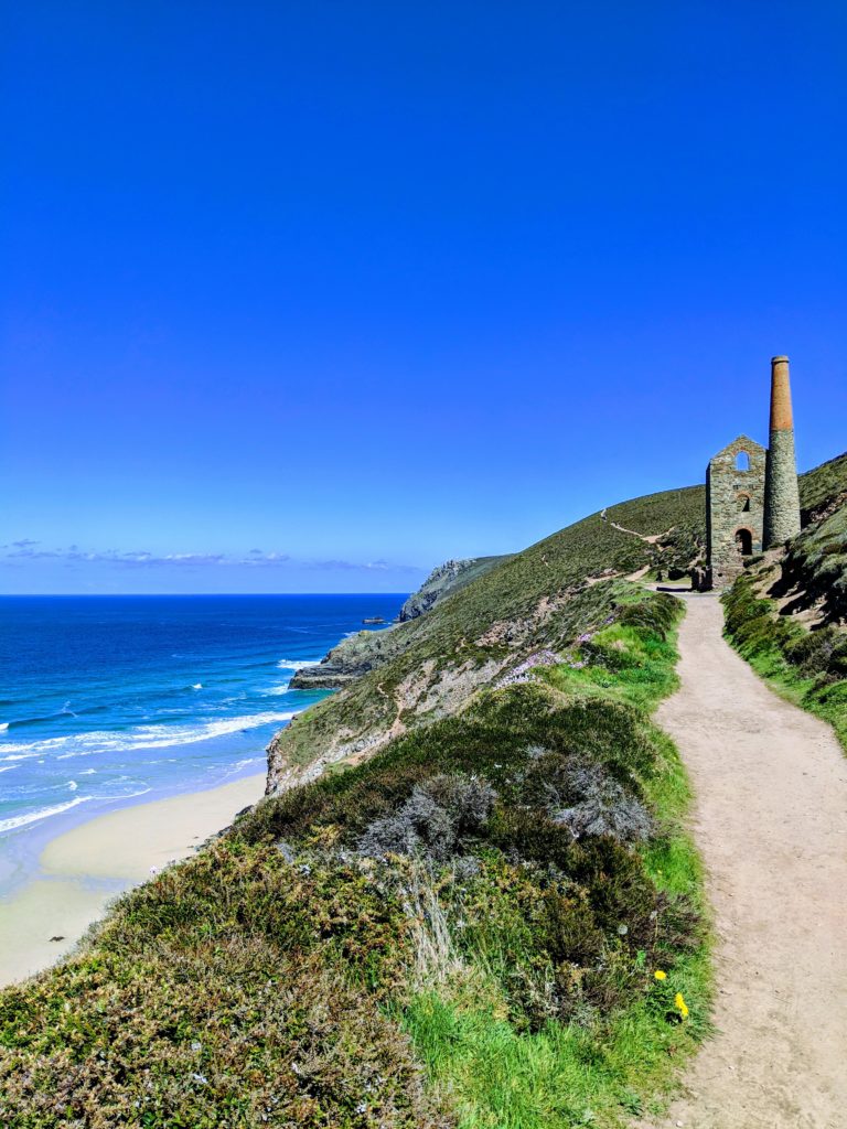 A view of Wheal Coates Tin Mine at Chapel Porth on a sunny day