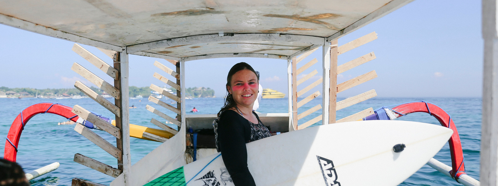 our surf sista in Indo wearing her pink zinc ready to surf.