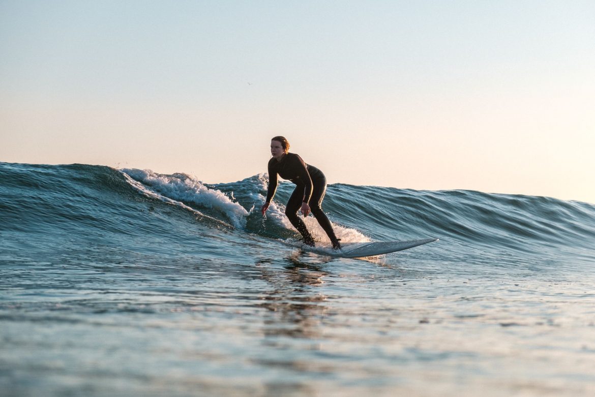Kirsty Taking a Green Wave at Sunrise, by Ben Battell